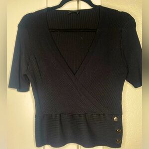Black and gold buttoned top